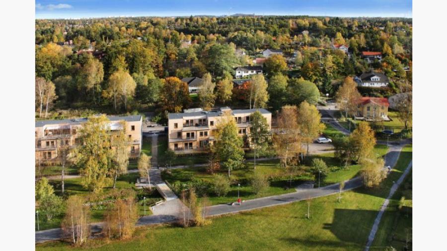 Flygbild fasader Ängsnäs terrass från parken    Foto: Zentuvo
